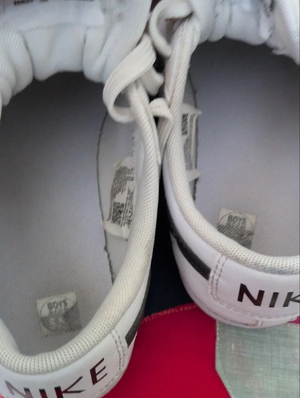 Nike White Sneakers with Black Stripe